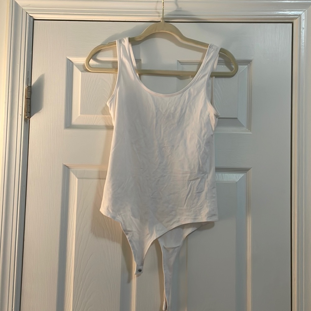 White one piece tank top. Size M.